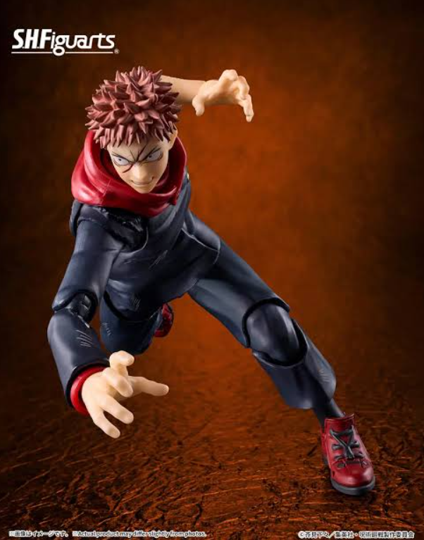 SH Figuarts collectible action figure of Yuji Itadori from Jujutsu Kaisen, posed dynamically in a crouching action stance against a textured brown background.
