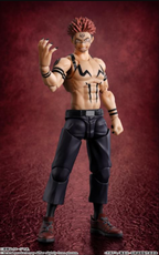 A detailed anime action figure of the character Sukuna from Jujutsu Kaisen, posed dynamically against a textured dark red background.