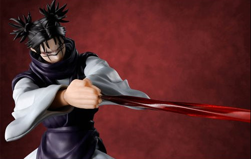 A collectible action figure of the character Choso from Jujutsu Kaisen, captured mid-action with his finger pressed onto the string of a large red bow, set against a textured dark red background.